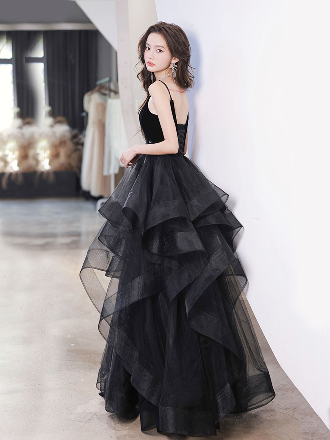 Women's glam black bodice floor length evening gown with silver tulle skirt